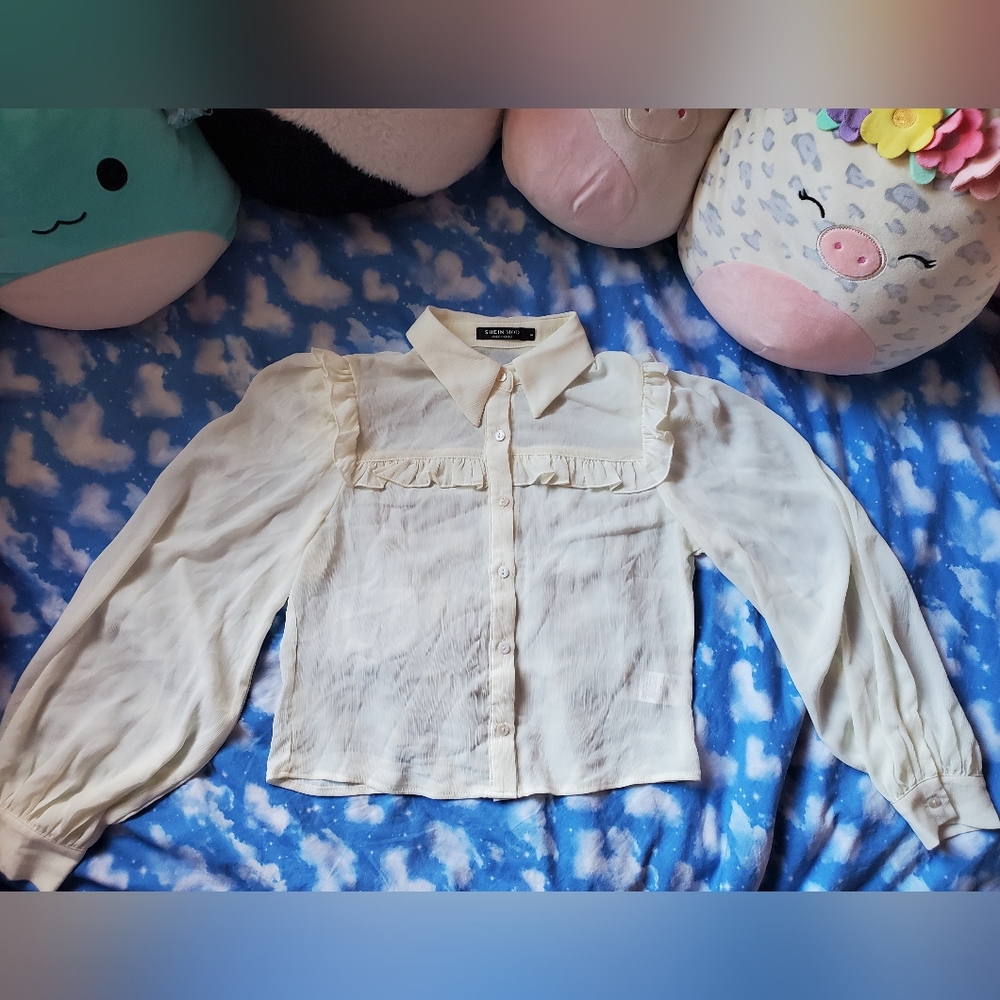 Cream ruffled button up blouse s